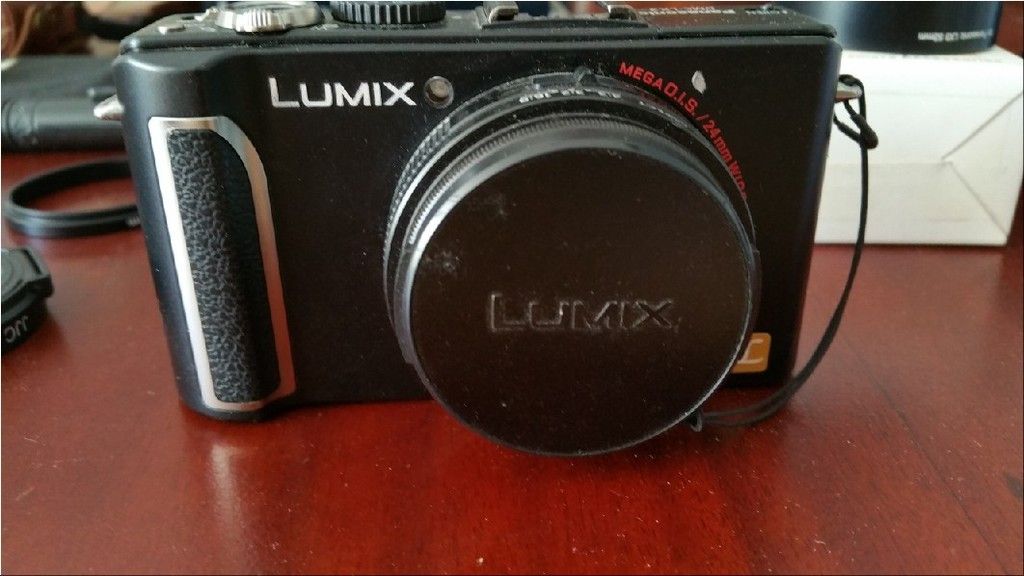 Cần bán Dell N7447, Panasonic Lumix LX3, Sharp SH01B ++SBH20(tặng kèm)