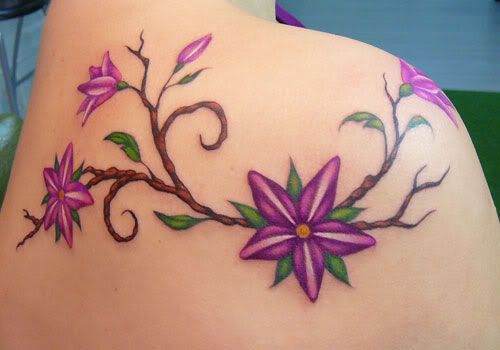 Women Shoulder Tattoo Flower Tattoo Img src ROSALINDA PHOTOS 2009