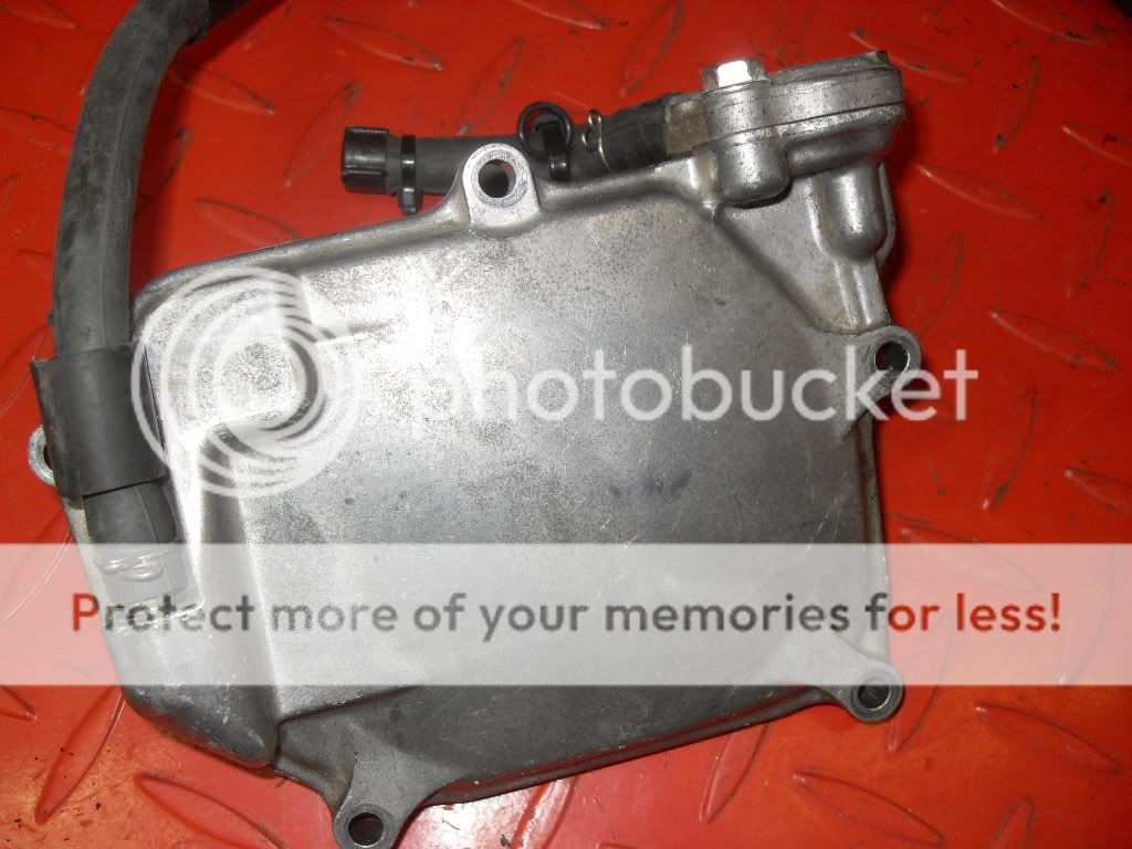 This is a used Honda Ruckus NPS50 Valve Cover . Please view the pics 